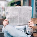 man-reading-newspaper