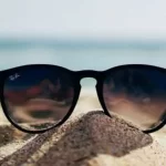 Sunglasses in the sand